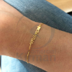Imagen de Entrepieza "mamá" con corazon en plata de ley de 925 chapada en oro